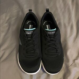 Skechers Women's Black Athletic Shoes with White Sole